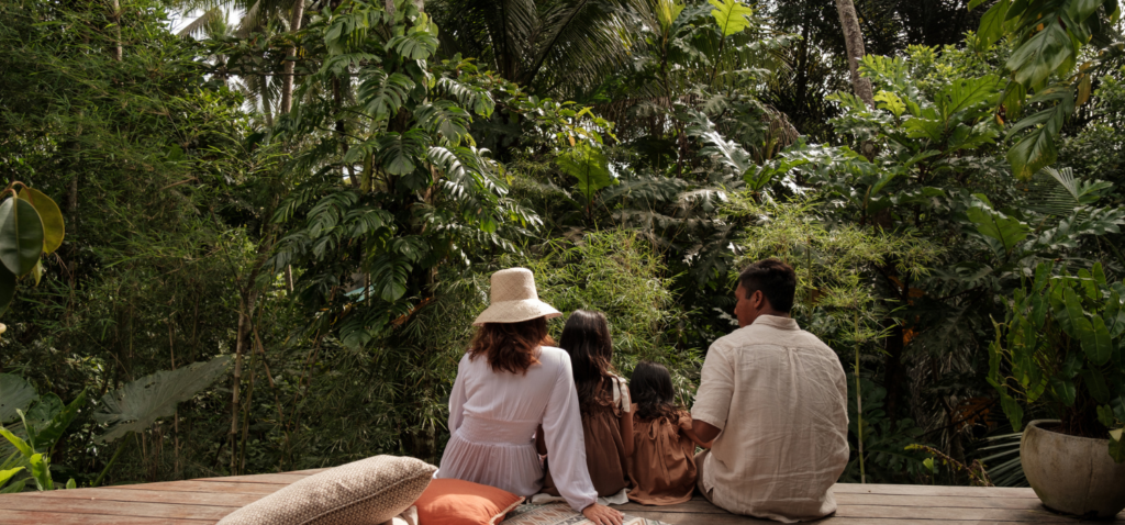 Family enjoying holiday with forest view